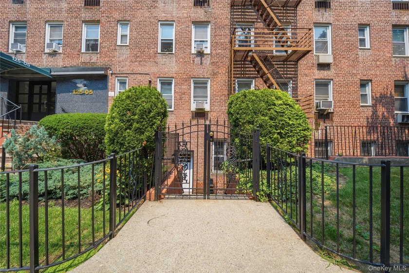 Welcome to this move-in-ready garden-level studio co-op at - photo 4