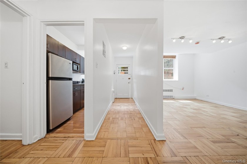 Welcome to this move-in-ready garden-level studio co-op at - photo 9