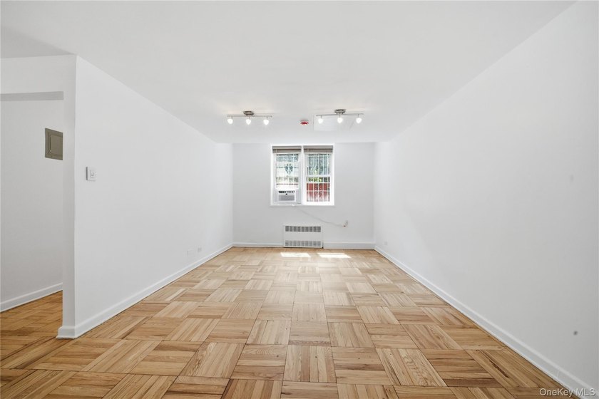 Welcome to this move-in-ready garden-level studio co-op at - photo 10