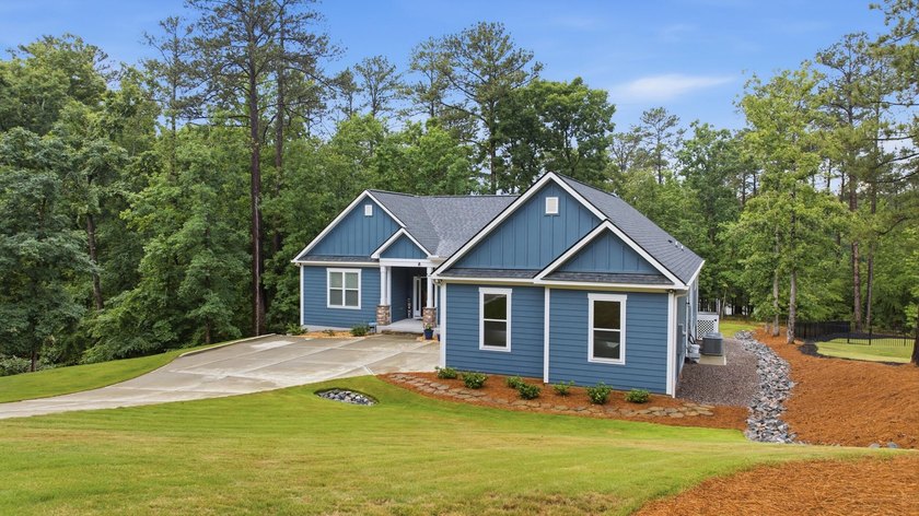Built just three years ago, this stunning custom lakefront home - photo 3