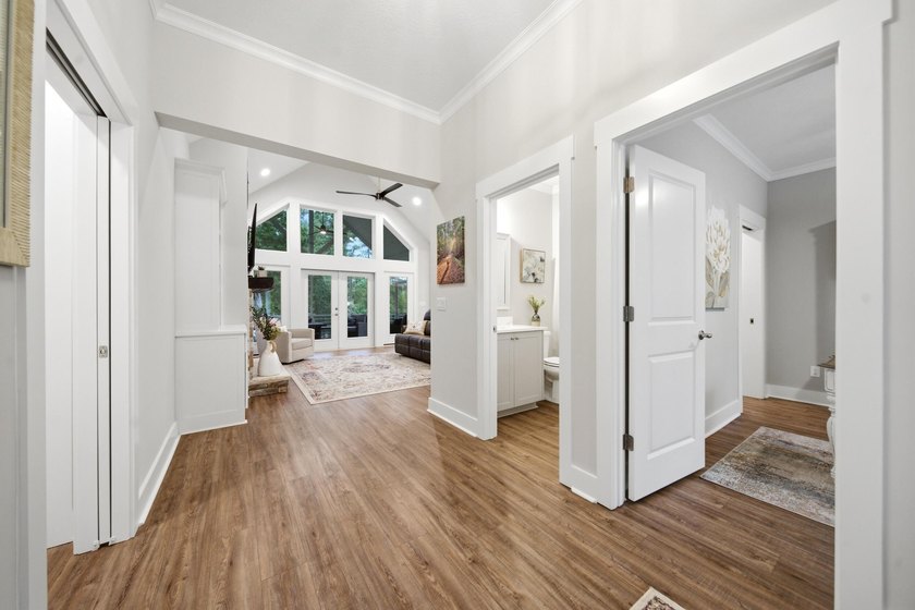 Built just three years ago, this stunning custom lakefront home - photo 5