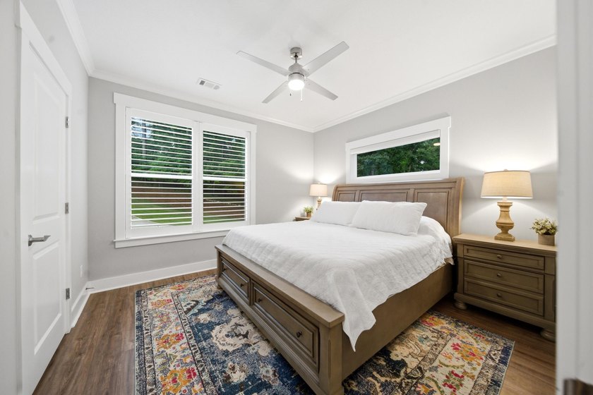 Built just three years ago, this stunning custom lakefront home - photo 10