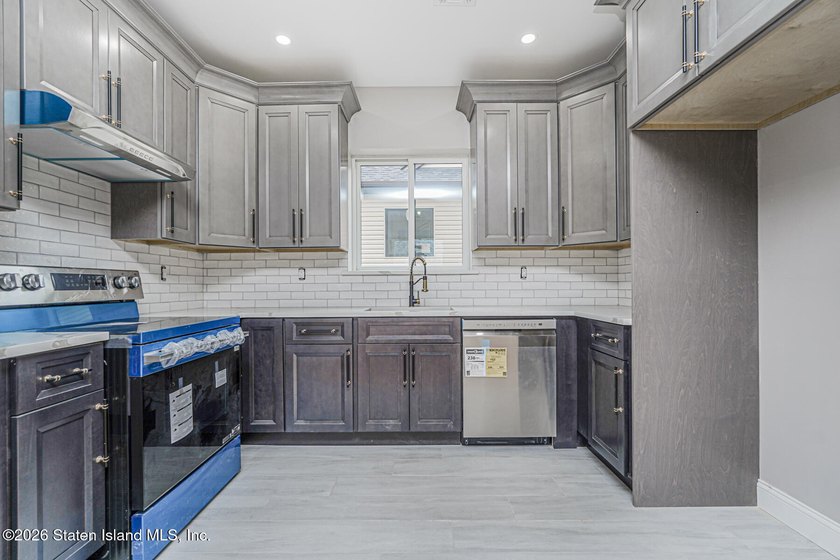 Welcome to this brand-new construction 7-over-7 two-family home - photo 31
