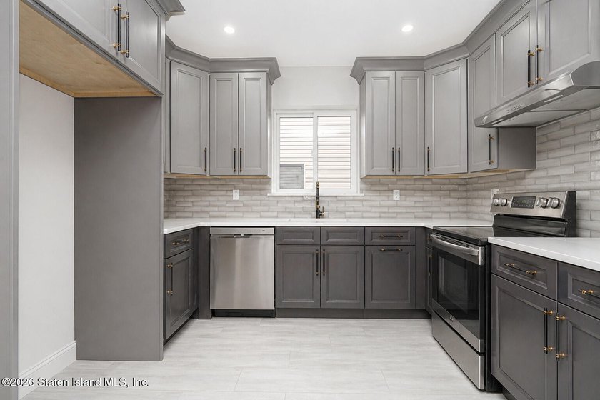 Welcome to this brand-new construction 7-over-7 two-family home - photo 44