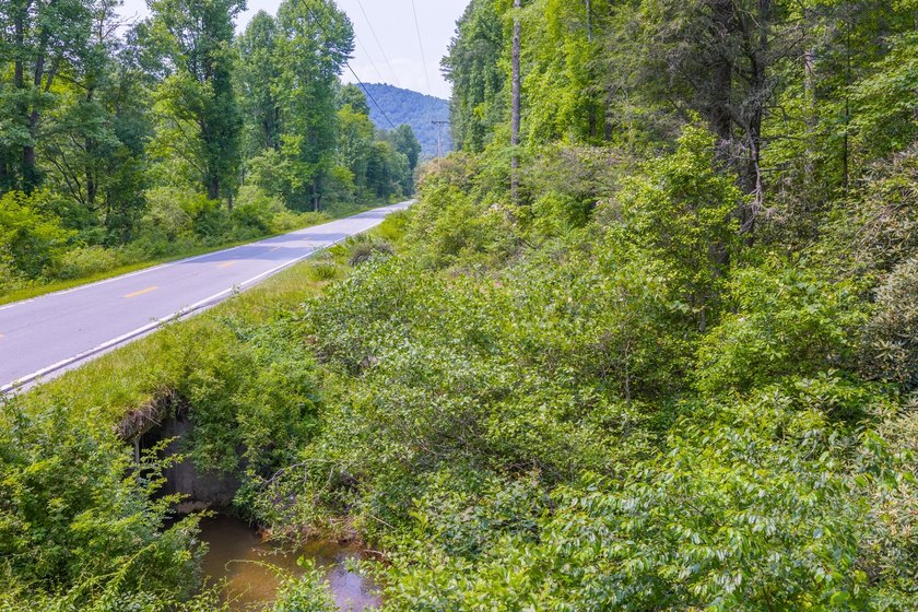 Beautifully wooded 5.83+/- gently rolling acres that adjoin the - photo 40