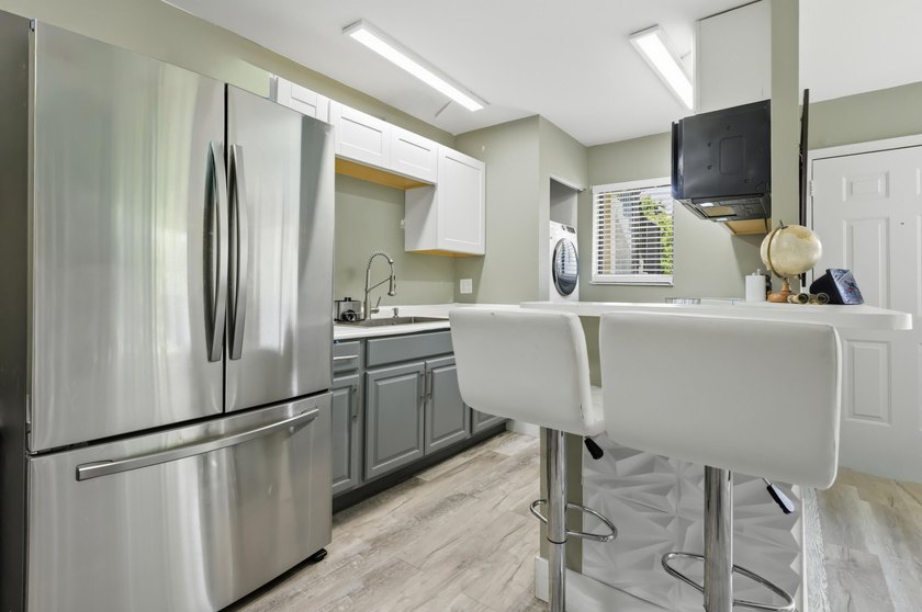 Welcome to this beautifully updated 2 bed 2 bath first-floor - photo 3