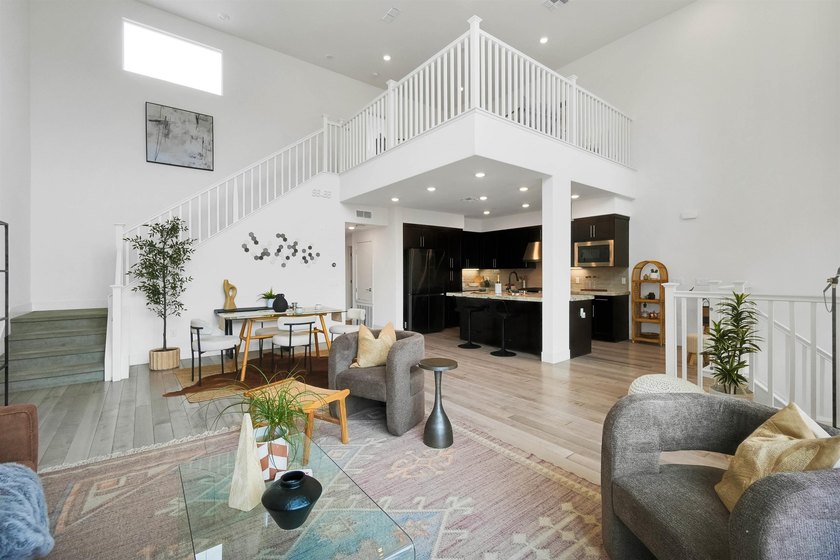 Built in 2021, this sophisticated townhouse-style condominium - photo 5