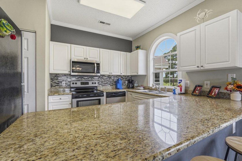Turnkey Coastal Living &amp; Premium Golf Views at Magnolia Place! - photo 11