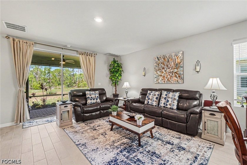 WELCOME to the home where the backyard steals the show! This - photo 3