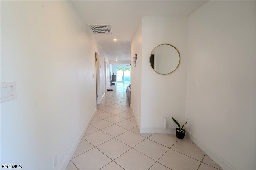 This is not your average Cape Coral home, and that's exactly the - photo 3