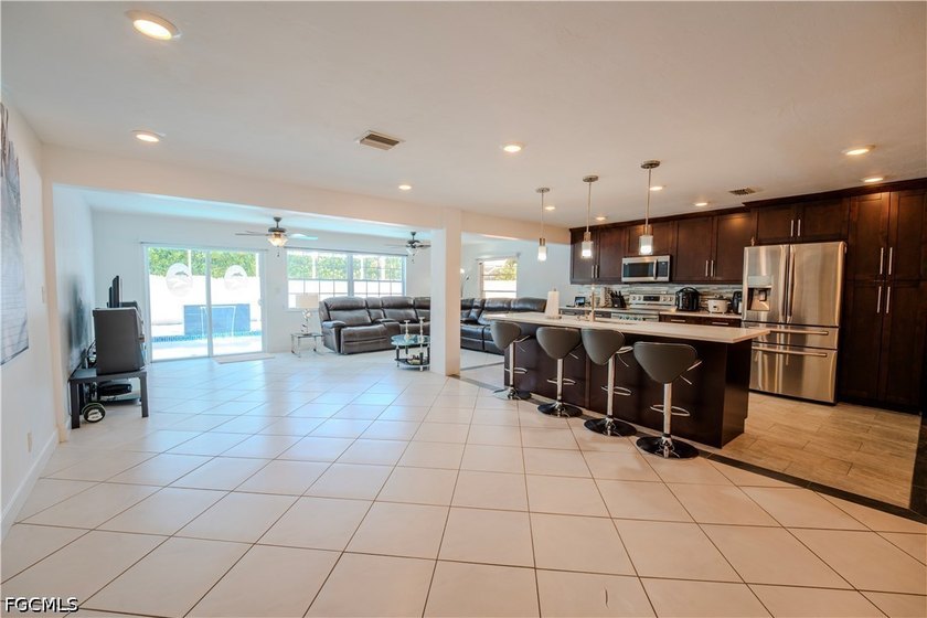 This is not your average Cape Coral home, and that's exactly the - photo 5