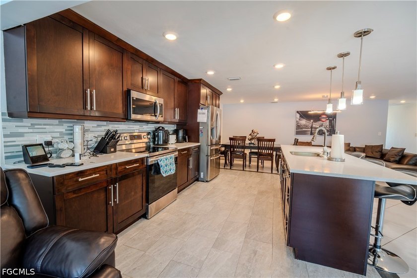 This is not your average Cape Coral home, and that's exactly the - photo 6