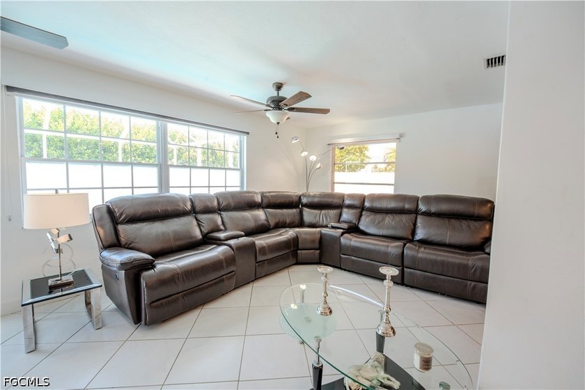 This is not your average Cape Coral home, and that's exactly the - photo 8