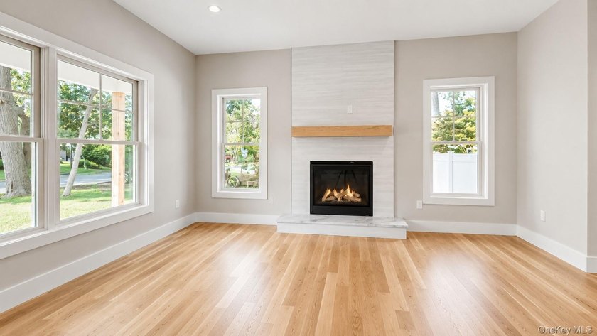 Custom-built Victorian-style home with a charming - photo 3