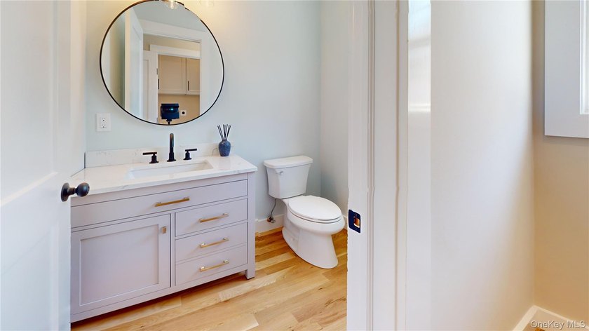 Custom-built Victorian-style home with a charming - photo 10