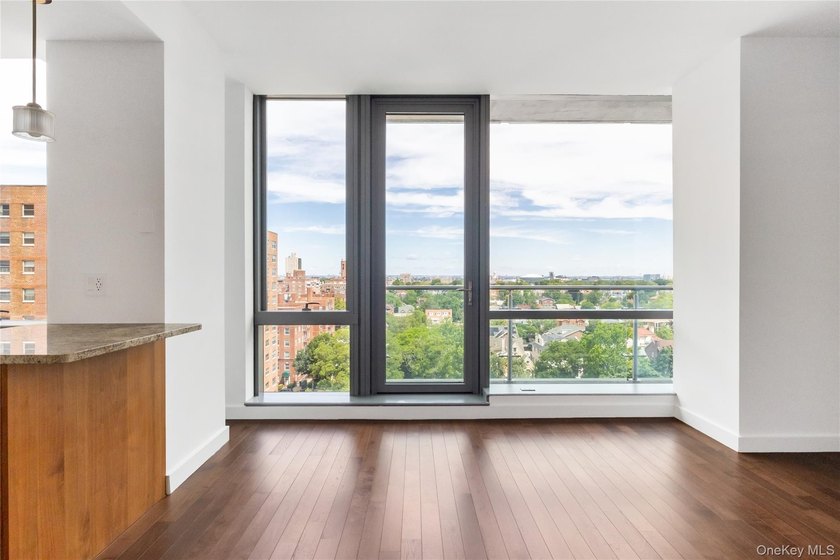 Welcome to Unit 9C at The Aston, a bright and modern high-floor - photo 5