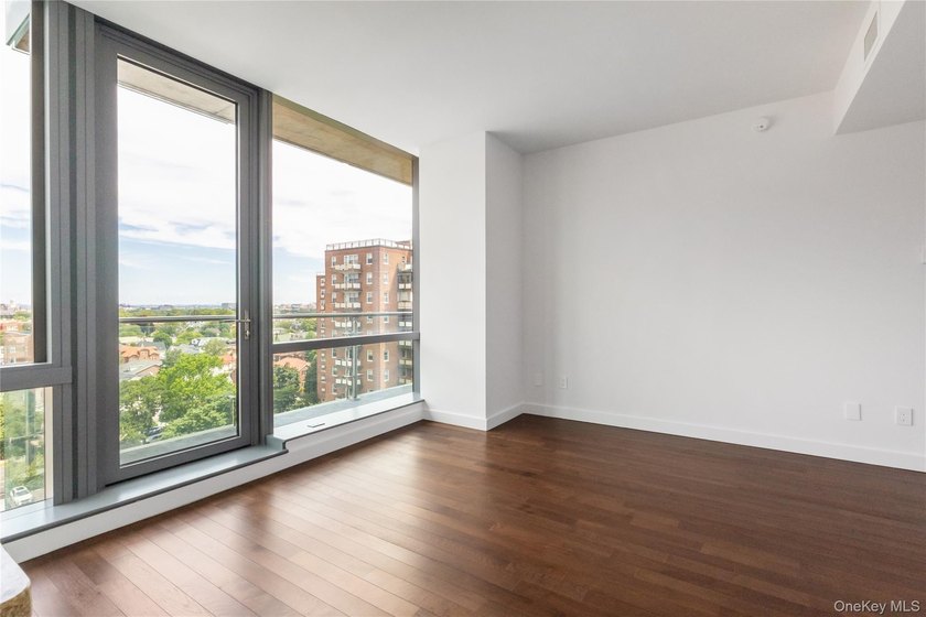 Welcome to Unit 9C at The Aston, a bright and modern high-floor - photo 6