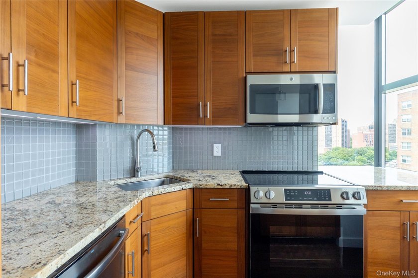 Welcome to Unit 9C at The Aston, a bright and modern high-floor - photo 7