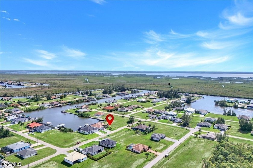 Gulf access, southern exposure, and wide canal views make this - photo 3