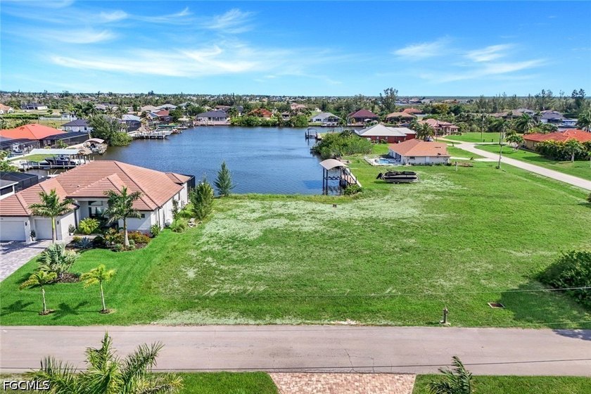 Gulf access, southern exposure, and wide canal views make this - photo 4