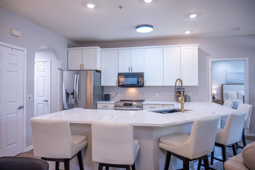 Experience resort-style living in this beautifully remodeled and - photo 2