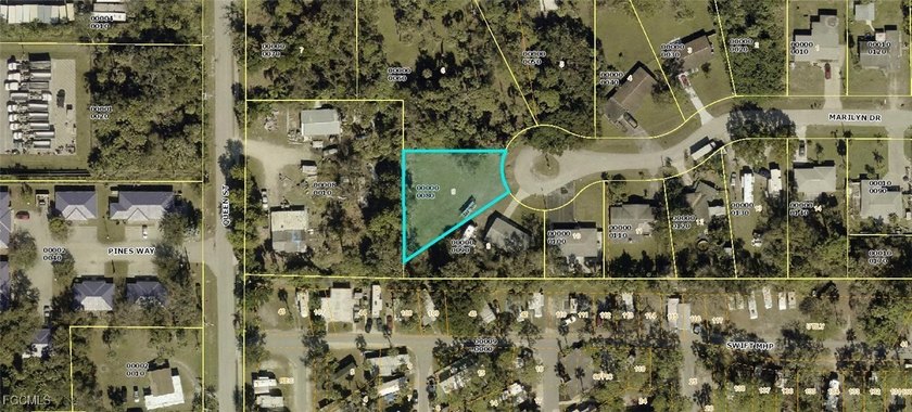 This vacant residential lot, just shy of a quarter of an acre - photo 3