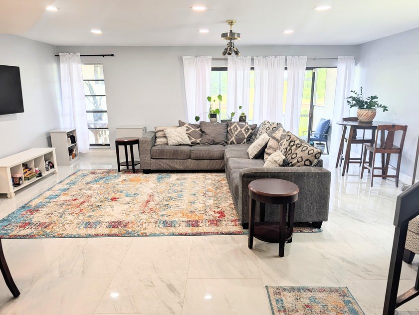 BACK ON THE MARKET! Spacious centrally located townhome in the - photo 5