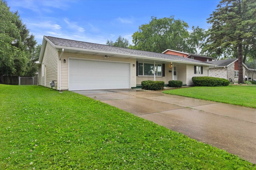 Tucked into an established northside neighborhood, this charming - photo 3