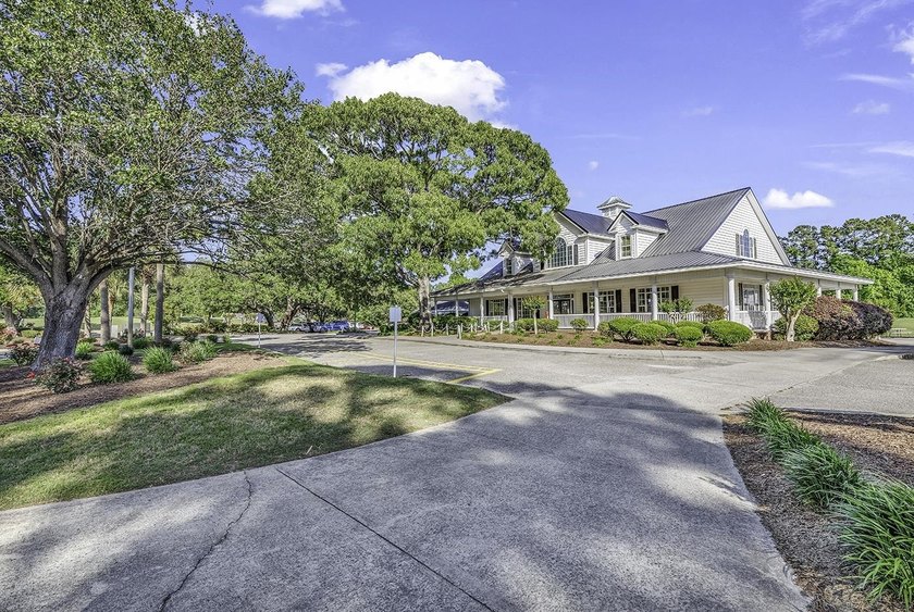 Tucked along the manicured fairways of the sought-after Eastport - photo 43