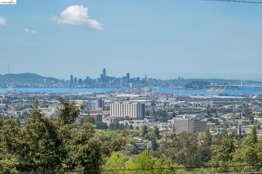 With sweeping views that stretch from downtown Oakland to the - photo 13