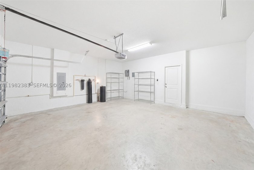 TWO CAR GARAGE ON A CORNER LOT. The home has 3 bedrooms, 2 baths - photo 11