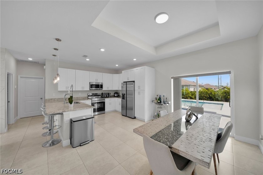 Beautiful 2023-built home in Cape Coral featuring impact windows - photo 10