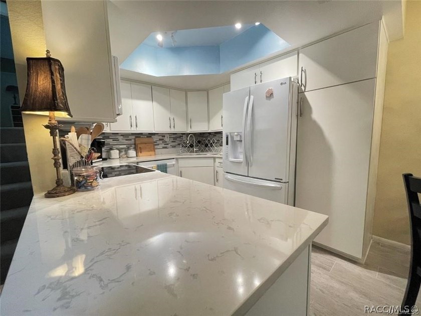Enjoy true waterfront living-without the maintenance headaches - photo 21