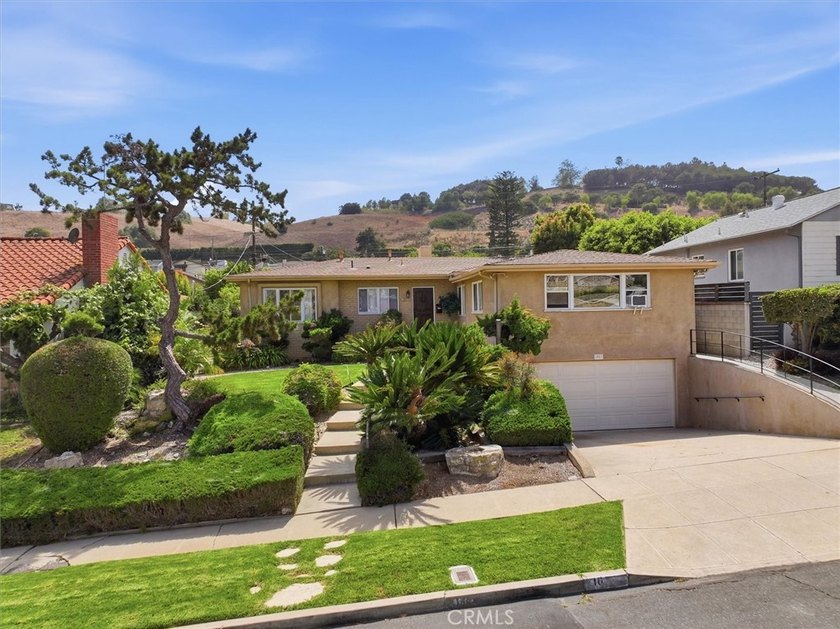 Welcome to 1027 S. Malgren Avenue, located in one of the most - photo 2