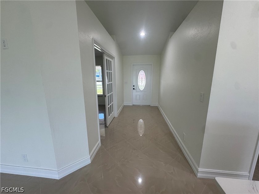 Beautifully renovated 3-bedroom, 2-bathroom home with a den - photo 3