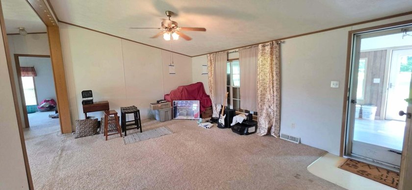 Nestled on 8 beautiful acres in Eubank, Kentucky, this charming - photo 11