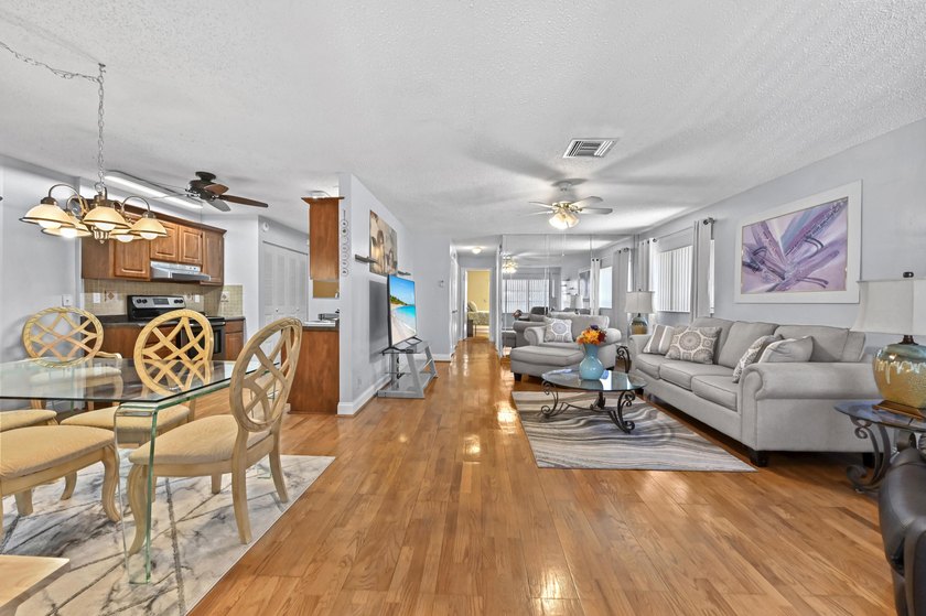 Cypress Lakes is a gated 55+ community featuring a - photo 4