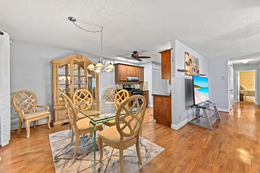 Cypress Lakes is a gated 55+ community featuring a - photo 5