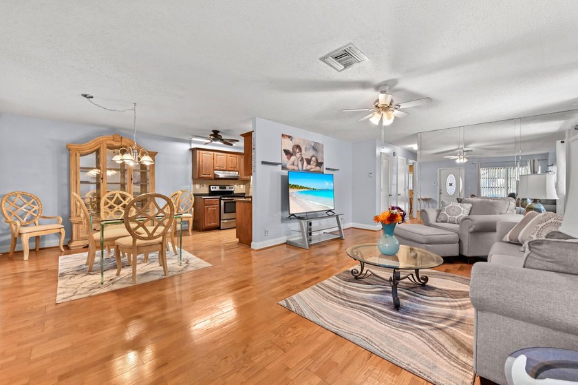 Cypress Lakes is a gated 55+ community featuring a - photo 6