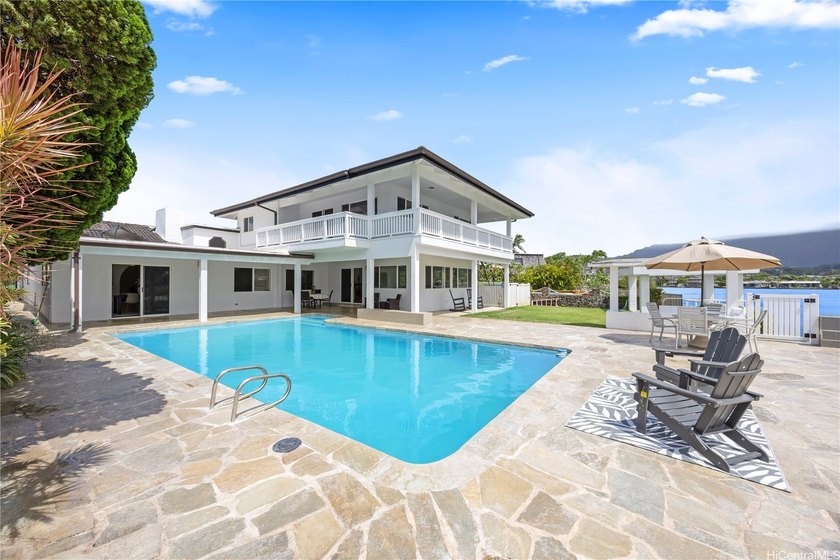 Set along the peaceful shoreline of a tranquil lake, this - photo 24