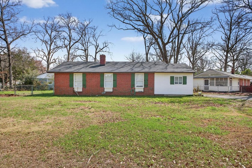 An investor's dream! Brick, ranch home located across the street - photo 2