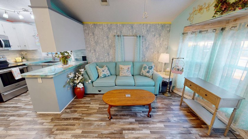 This single-story home is in Reflections On Silver Lake (55+ - photo 12