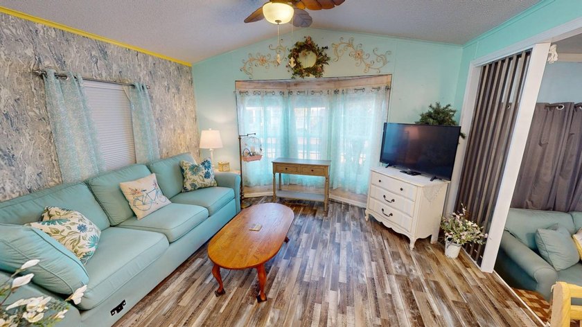 This single-story home is in Reflections On Silver Lake (55+ - photo 14