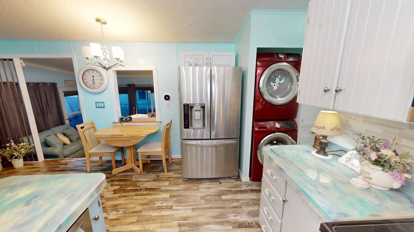 This single-story home is in Reflections On Silver Lake (55+ - photo 18