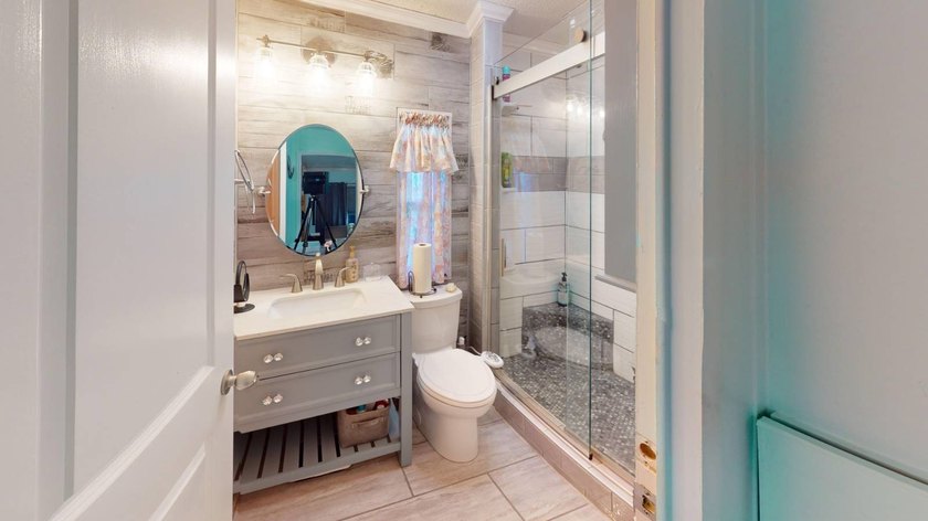 This single-story home is in Reflections On Silver Lake (55+ - photo 24