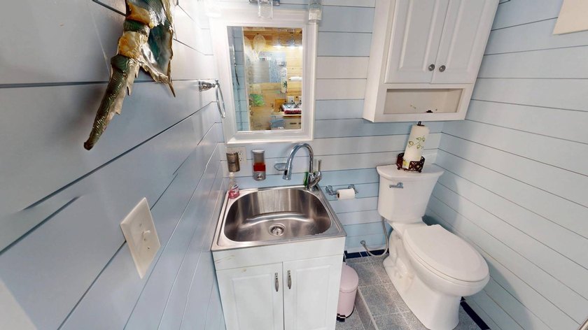 This single-story home is in Reflections On Silver Lake (55+ - photo 28