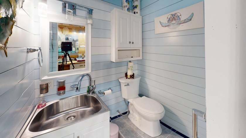 This single-story home is in Reflections On Silver Lake (55+ - photo 29