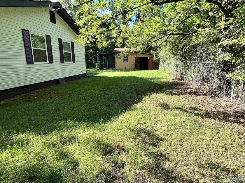 Newly remodeled 3-bedroom 2-bath home just across the road from - photo 4