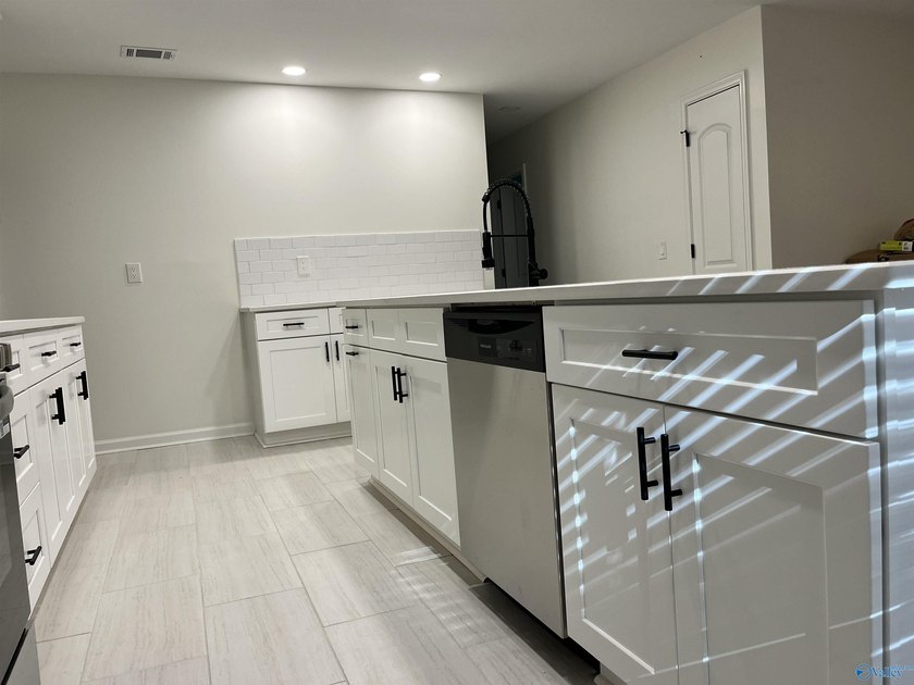 Newly remodeled 3-bedroom 2-bath home just across the road from - photo 8