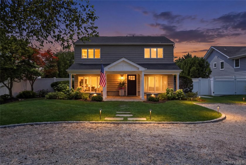 Welcome to this tastefully updated 4-bedroom, 3-bath home in one - photo 4